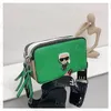 Tasarımcı Çanta Kadın Çanta Siyah Omuz Çantası Snap Kamera Çantası Crossbody Moda Kravat Lüks Deri İtalik Flast kayış çantası Yüksek Doku Mini Karikatür Mark Çanta