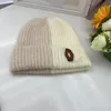 Gorros de diseñador para mujer, gorro de lana de invierno, versión coreana, gorro tejido cálido, Color retales, gorro para el frío, 2023 C