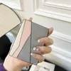 LOVE Designer Wallet Fashion Top Layer Cow Pickup Bag Short Light And Thin Card Holder Bag Small Purse Luxury Women Men Documents Wallets G2312069-5