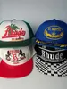 Rhude Fashion Designer Brand Printed American Truck Hat Spring and Summer Coupple汎用性のあるサンバイザーレジャースポーツ野球帽Bapes Hat 2933