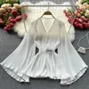 Blusas femininas primavera verão sólido solto topos europeu manga larga plissado chiffon camisa das mulheres sexy com decote em v preto branco blusa longa