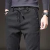 Herrbyxor 2023 varumärke Autumn Winter Borsted tyg casual män tjockt affärsarbete Slim Cotton Black Grey Trousers Man 231205