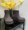 Gli ultimi popolari stivali da pioggia con motivo tessuto ecologico