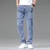 Kvinnors jeans män smala stretch mager multi pocket modedesigner denim byxor manliga märke kläder byxor streetwear 231206