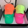 Casquettes de baseball Casquettes de baseball Casquette de créateur Candy Fluorescent Coton Baseball Couple Mode Lettre Street Shooting Cap273J