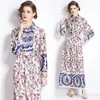 Vintage Lace Up Print Boho Maxi-jurk Robe Woman Designer Revers Slank Elegant Fit Knoopsluiting Vakantie Ruches Jurken 2023 Lente Herfst Lange Mouwen Feest Runway Jurken