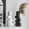 Vase Creative Pebble Vase Home Decoration装飾的なセラミックフラワーボトルフラワーアレンジメントコンテナ抽象的なアートの装飾