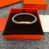 Bracelets de luxe pour hommes Designer pour femmes Bracelet tissé classique Lettres en argent Boucle Designer Bijoux Bracelet