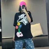 女性用Tシャツパンクスタイルアメリカンレトロストリートスカルフラワーフォーム半袖Tシャツユニセックスインセックストップ品質カワイイ服