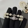 Nowe modne kobiece bransoletki z koralikami gorąca marka Pearl Sieć Planet Bracelets Saturn Pearl Bransoletka Punk moda dla kobiet designerskie akcesoria biżuterii