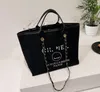 Designer Strandtassen met grote capaciteit Luxe merk tote dames schoudertassen boodschappentas Mode Plunjezakken handtas portemonnee CC635