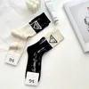 Hosiery Socks European high-end women's socks with glue letters and color matching double needle mid length socks fashionable designer style trendy dirty 2CZ3