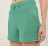 Mulheres esportes waffle shorts outfits cintura alta esportiva bolso fitness wear calças curtas meninas yoga cordão elástico