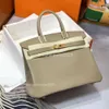 2024 Rkinbir Tote Real Layer Bag Ladies Classic Bags Palm Leather Gold Portable Handväskor Huvudlåskapacitet Stor Cowhide äkta spänne mönster Kvinnor dmtib6e