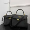 Designer Luxury Kilyee Bag Bag läder Kvinnospåse Togo Top Layer Cow Högklassig bred axelband Enkel axel Messenger Handväska