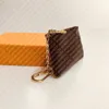 M62650 Key Pouch Pochette CLES Designer Fashion Women's Men's Ring Ring حامل عملة المحفظة