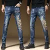 Outono e inverno jeans marca de moda masculina moda nacional kirin bordado calças masculinas elástico fino ajuste pés calças china-chique