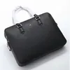 Nuova marca Designer valigetta da uomo Bags famoso Brand Mens Occiglia Real Handbag3114