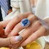 Anel solitário Bling Lab Aquamarine Diamond Ring 925 prata esterlina festa de casamento anéis de banda para mulheres nupcial noivado jóias presente YQ231207