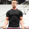 Garnitury męskie A2510 MĘŻCZYZN KRÓTKO SŁONKIE STAŁY BAWA T-shirt T-shirt Fitness Culturyting Trening