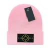 Nouveau chapeau tricoté mode lettre casquette populaire chaud coupe-vent extensible multicolore haute qualité bonnet chapeaux personnalité rue Style Couple chapeaux E-5