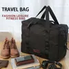 Duffel Bags Sport Travel Bag stora kapacitet Oxford Waterproof Bag Fashion Helg Handväska Singel-axel Kvinnors Duffel Bag Suitcase 231207