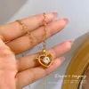 Ожерелья с подвесками Женское подвесное ожерелье с сохранением цвета Гипоаллергенный в форме сердца Для Свитер Рубашка Подтяжки Футболка Платье