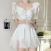 Kvinnors badkläder Summer Korean version White Slim Short Sleeve V-hals Ruffles med bröstkudde utan stålstöd Bikini Tvådelar Set