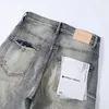 diseñador amirssNuevos jeans de hombre moteados con parche en la rodilla gris claro de vaca de marca púrpura