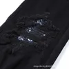 designer amirssNuovi jeans da uomo alla moda con fiore di anacardi e buco nero