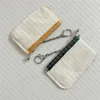 y62650 الأزياء الأزياء القماشية المحفظة المحفظة COIN COR KEY BEACH CASTER CASE CASE CASE CASH Charm Pochette CL