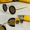 Fritidsmän och kvinnors designer högkvalitativ krökad metallram solglasögon guldmetallben 40094U söt flerfärgad rundram gafas de sol strandfester semester