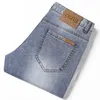 Jeans pour hommes Jeans de marque La marque CGIUI se concentre sur les nouveaux jeans à petites jambes de style européen haut de gamme, les pantalons de mode pour jeunes élastiques à coupe slim pour hommes VH9G