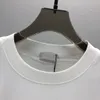 Designer New Top T-shirt allentata estiva Camicia casual di moda Abbigliamento di lusso Street Camicia carina da uomo T-shirt da coppia neutra di alta qualità SS11