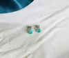 Orecchini a lobo 2023 Confezione rotonda con diamanti pieni di smeraldi simulati da 5 mm per donne in argento 925