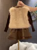 Set di abbigliamento Set di vestiti per ragazze Autunno Inverno Bambini Moda Maglione di lana Cappotto Top in maglia Gilet Gonna di pelle 231207