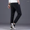 Spodnie męskie swobodne zimowe ciepłe, grube wewnętrzne podszewka Plush Solid Black Thermal Sports Pocket Spodni Ubranie