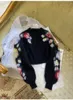 2023 Pullover da donna con stampa di fiori neri Maglioni da donna dello stesso stile della marca DH03