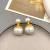 Ohrstecker Europäische und amerikanische Retro-eingelegte doppelseitige Perle für Damen, elegante Mode, vergoldet