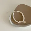 Link bransoletki tiowios 2023 Francuska vintage opal perła miłość metalowa osobowość prosta bransoletka temperamentowa
