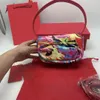 Top Designer Bag Hand Bag Dingdang Bag Dsl Bag Fashion Bolsas de axila bolsas Bolsas de lujo Bolsas de cuerpo cruzado Bag de mujeres One hombro Bolso de Straddle Versátil 20