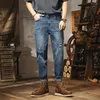 Pantaloni jeans da uomo Pantaloni oversize da uomo Autunno Primavera Stlye Street Wear Abbigliamento strappato alla moda Pantalone in denim casual taglie forti