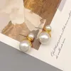 Boucles d'oreilles à clous pour femmes, rétro européen et américain incrusté de perles Double face, luxe élégant, mode plaqué or 18 carats