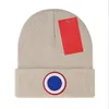 Diseñador Invierno Gorro de punto Gorro de lana Hombres Mujeres Punto grueso Grueso Cálido Piel sintética Pom Gorros Sombreros Gorro femenino Gorros 22 colores B-10