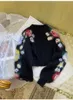2023 Damestrui met zwarte bloemenprint Merk dezelfde stijl damessweaters DH03
