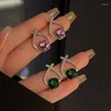 Boucles d'oreilles pendantes U-Magical Fantasy, strass violets et verts pour femmes, bijoux de fête en métal creux avec croix scintillante