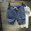Jeans voor heren 2023 Lente en zomer nieuwe jeansmode Herenjeans Shorts Fashion Wash Hole Patch Slim Fit Elastic Capri herenkledingL231209