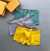 Sous-vêtements Hommes Sous-vêtements Designer Sous-vêtements courts Boxer Soie de glace Été Section ultra mince Populaire Short en vrac Tête Slit Q699