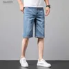 Męskie dżinsy Summer Nowe męskie niebieskie szczupłe dżinsy moda swobodna cienka rozciągająca bawełna wygodne dżinsowe spodenki krótkie spodnie 231208