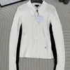 Kvinnors stickor Tees Designer helt ny stickad bottenskjorta med klassisk svartvit kontrastdesign Polo krage bokstavsmönster för slant mångsidig passform hkpe